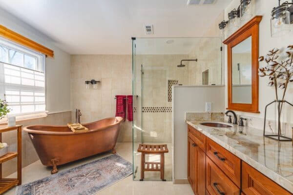 Smart bathroom technology including touchless fixtures, voice controls, and digital mirror displays
